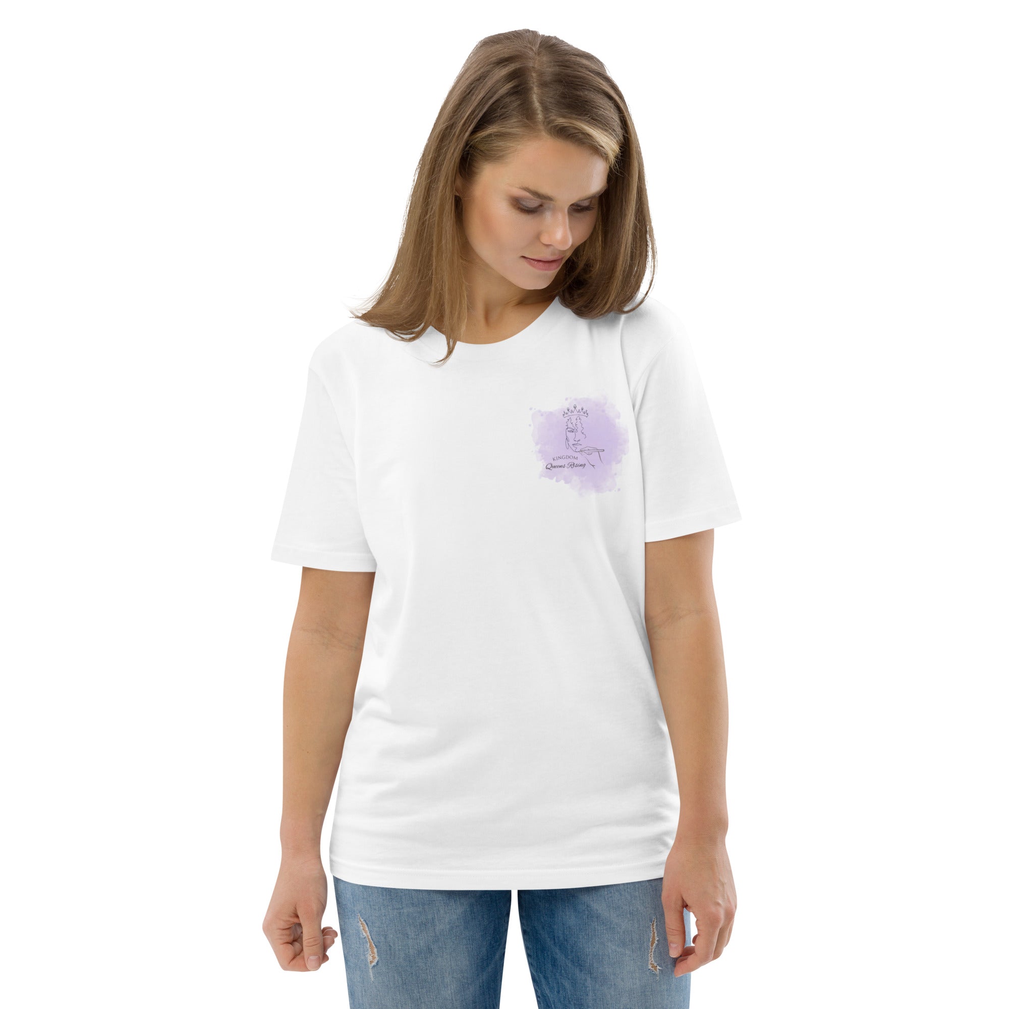Front side view of white t-shirt with Kingdom Queens Rising fancy letters purple Logo with woman's face hand drawn wearing a crown on the left side chest of t-shirt.